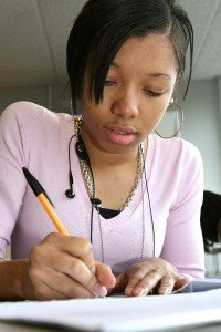 bigstock_Pretty_Student_Revising_For_He_1668433